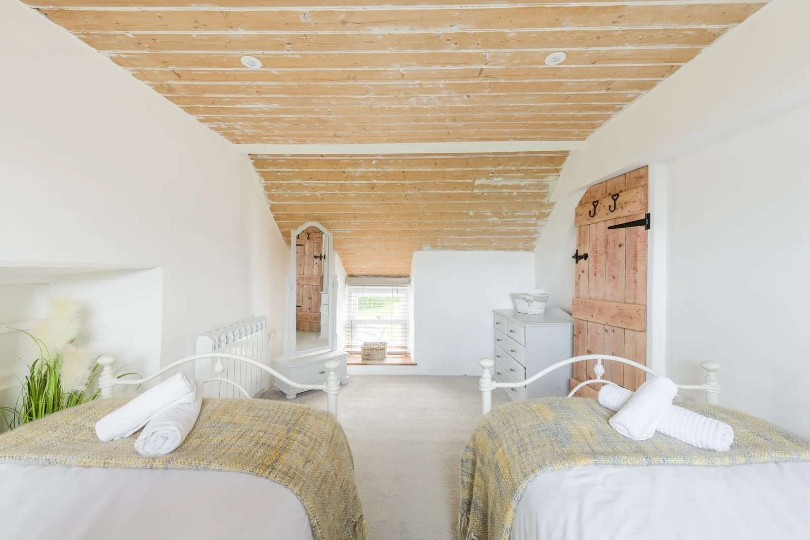 Double bedroom at Tyn y Big Estate, reverse view